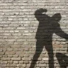 assaulting